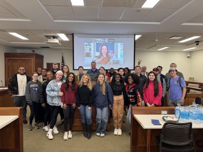 Ryanne Saucier speaks with students over zoom. 